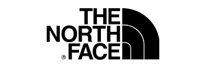The North Face logo depicting a stylized mountain range and the brand name in bold letters. The North Face is a renowned outdoor apparel and equipment brand known for its high-performance clothing, footwear, and gear.