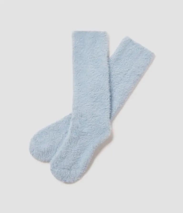 Light blue Southern Shirt cozy socks, ideal for relaxing at home after a day in Destin.