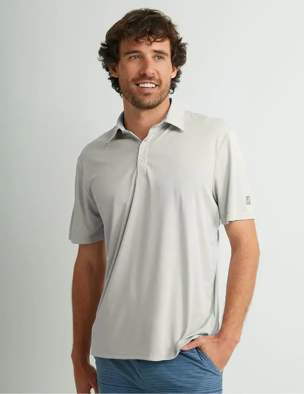 Men's gray Huk polo shirt, perfect for casual wear on the water in 30A.