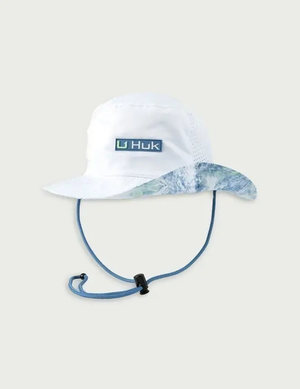 Huk wide-brim sun hat, ideal for outdoor adventures along the Gulf Coast.