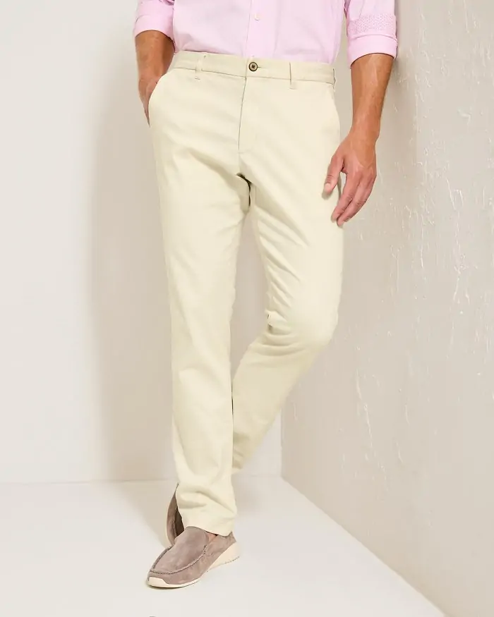 Cream Tommy Bahama trousers, perfect for versatile wear during coastal adventures in Destin.