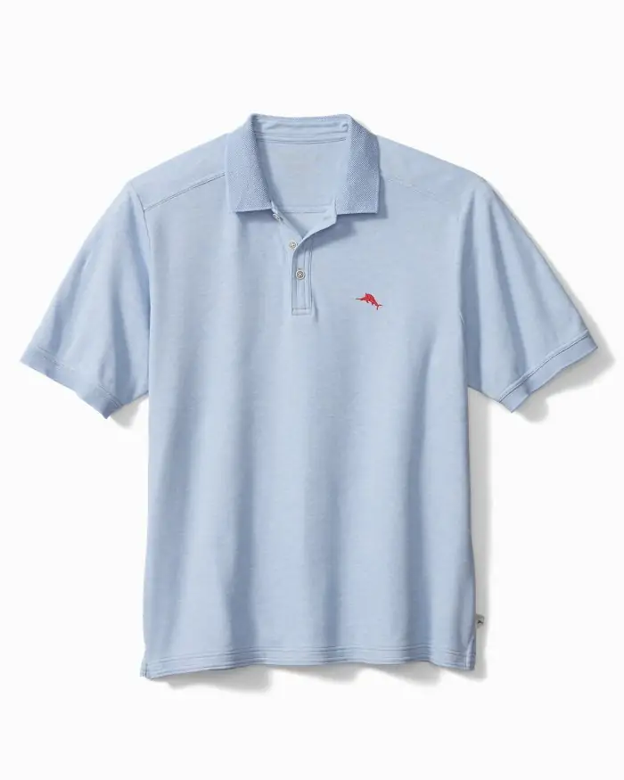 Light blue Tommy Bahama polo shirt with a red embroidered marlin logo, combining casual style and performance for Grayton Beach and Miramar golf days.