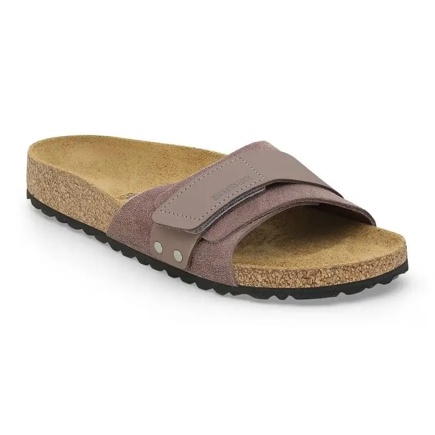 Minimalist taupe Birkenstock sandal with a suede and adjustable strap, ideal for casual adventures along Florida’s Emerald Coast.