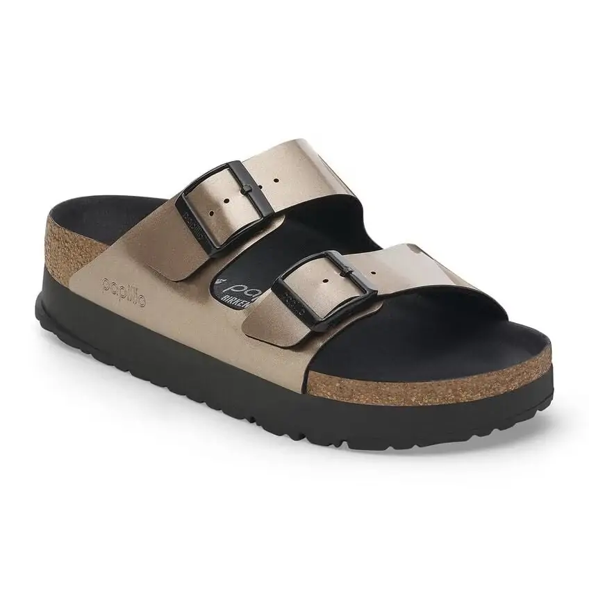 Sleek bronze Papillio by Birkenstock sandal with double straps and a contoured cork footbed, great for coastal style and comfort in Fort Walton Beach.