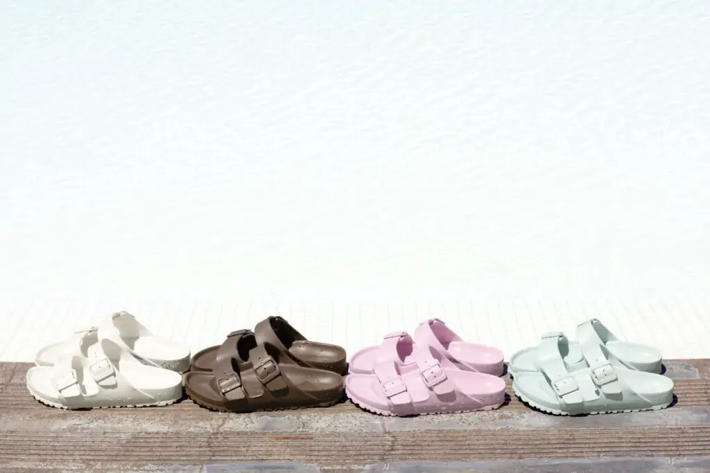 Line of multiple Birkenstock sandals in various colors, perfect for the coastal lifestyle in Panama City Beach, Destin, and 30A, offering stylish and comfortable options for beachgoers and outdoor enthusiasts.