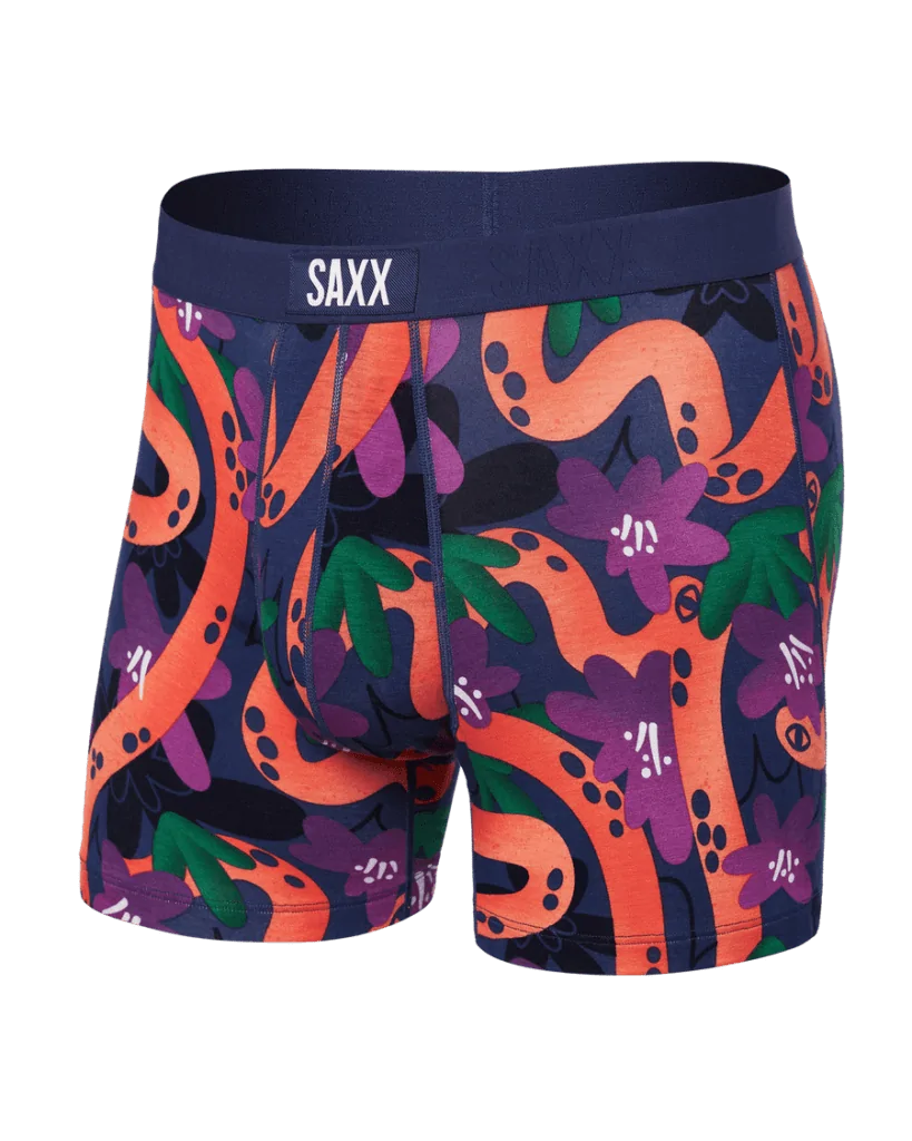 Vibrant SAXX boxer briefs with bold orange and purple snake and jungle patterns, bringing energy and style to any adventure in the Florida Panhandle.